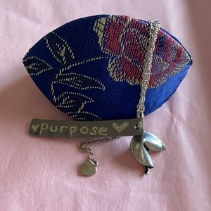 Hand stamped fortune cookie necklace.